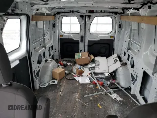 2018 Ford Transit z VIN 1FTYR1ZM7JKB17391, wystawiony jako Copart lot #46845195 z przebiegiem 170 533 mil mil oraz Szkoda całkowita • Salvage title. Historia ofert i sprzedaży dostępna na DreamBid. Obrazek 10.