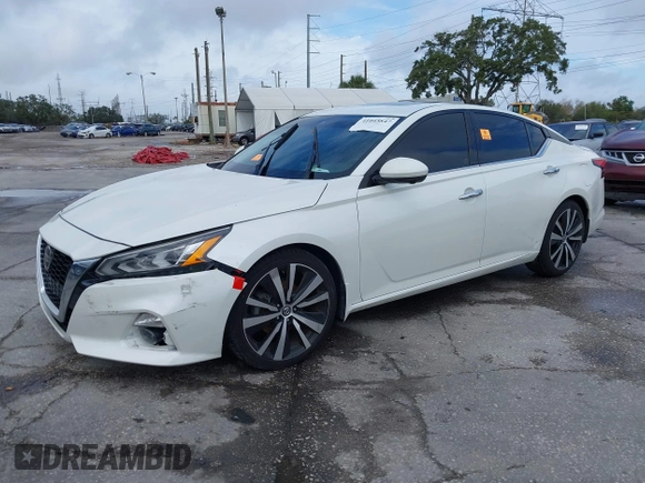2020 Nissan Altima Platinum with VIN 1N4BL4FV0LC146255, listed as a IAAI auction lot 41043847 with 74,521 mi miles and . Bid and sale history available at carsss.com. Image 2.