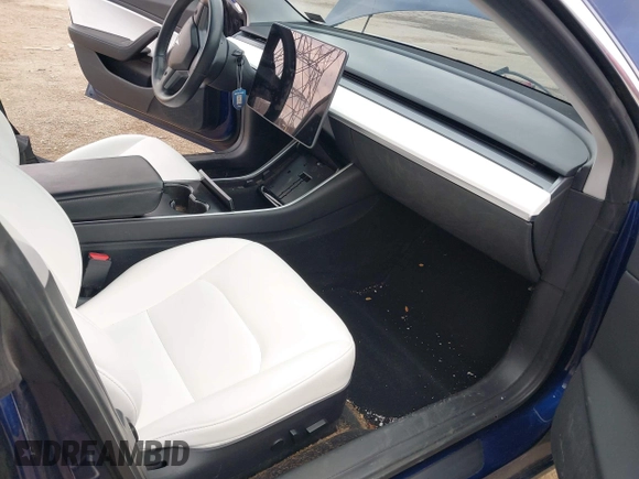 2018 Tesla Model 3 Long Range Battery with VIN 5YJ3E1EB2JF056166, listed as a IAAI auction lot 41847972 with 126,126 mi miles and . Bid and sale history available at DreamBid. Image 5.