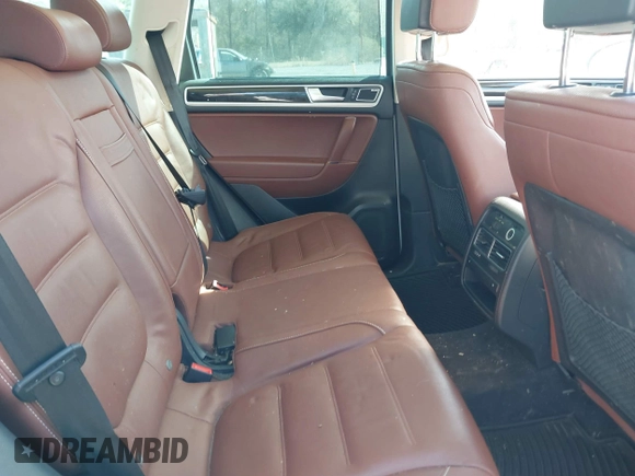 2016 Volkswagen Touareg Sport with VIN WVGEF9BP5GD012680, listed as a IAAI auction lot 41610943 with 153,952 mi miles and . Bid and sale history available at DreamBid. Image 8.