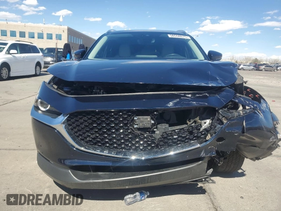 2023 Mazda CX-30 S Carbon Edition z VIN 3MVDMBCM3PM554378, wystawiony jako Copart lot #50558075 z przebiegiem 26 658 mil mil oraz Szkoda całkowita • Salvage title. Historia ofert i sprzedaży dostępna na DreamBid. Obrazek 5.