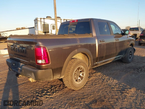 2017 Ram 1500 Rebel z VIN 1C6RR7YT0HS534465, wystawiony jako IAAI lot #41240431 z przebiegiem 125 886 mil mil oraz . Historia ofert i sprzedaży dostępna na DreamBid. Obrazek 4.