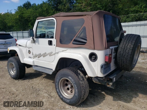 2001 Jeep Wrangler Sahara with VIN 1J4FA59SX1P338887, listed as a Copart auction lot 72835514 with 0 mi miles and Salvage Title. Bid and sale history available at carsss.com. Image 2.