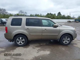 2009 Honda Pilot EX-L with VIN 5FNYF48569B002035, listed as a IAAI auction lot 41838347 with 198,849 mi miles. Bid and sale history available at carsss.com. Image 14.