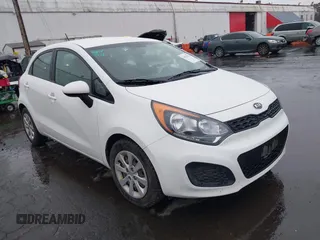 2012 Kia Rio LX with VIN KNADM5A3XC6017625, listed as a IAAI auction lot 41593634 with 129,814 mi miles. Bid and sale history available at carsss.com. Image 1.