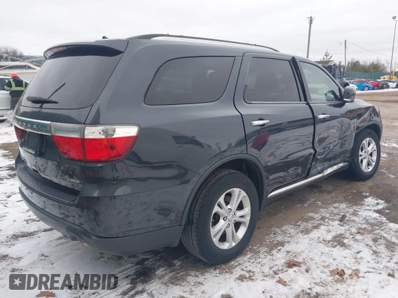 2013 Dodge Durango Crew z VIN 1C4SDJDT7DC684766, wystawiony jako IAAI lot #41277670 z przebiegiem 115 555 mil mil oraz . Historia ofert i sprzedaży dostępna na DreamBid. Obrazek 4.