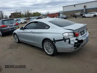 2016 BMW 4 Series 428i xDrive with VIN WBA3N9C56GK249666, listed as a Copart auction lot 53881285 with 140,031 mi miles and Salvage title. Bid and sale history available at DreamBid. Image 2.
