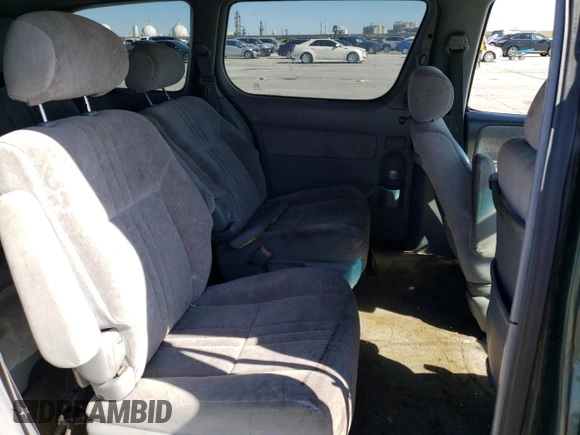 2000 Toyota Sienna LE with VIN 4T3ZF13C2YU193910, listed as a Copart auction lot 56395564 with 228,638 mi miles and Salvage Title. Bid and sale history available at carsss.com. Image 11.