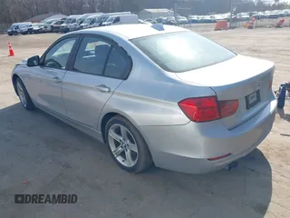 2012 BMW 3 Series 328i with VIN WBA3A5C59CF349364, listed as a IAAI auction lot 41764345 with 187,221 mi miles and . Bid and sale history available at carsss.com. Image 3.