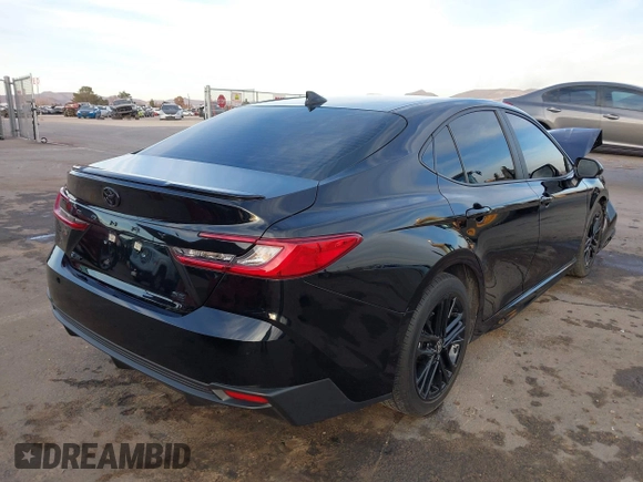 2025 Toyota Camry LE z VIN 4T1DAACK5SU523507, wystawiony jako IAAI lot #41389041 z przebiegiem 5 027 mil mil oraz . Historia ofert i sprzedaży dostępna na DreamBid. Obrazek 4.
