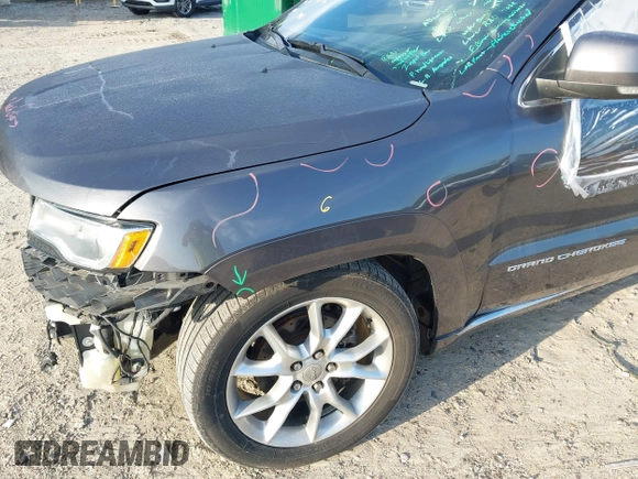 2015 Jeep Grand Cherokee Summit with VIN 1C4RJFJG0FC611768, listed as a IAAI auction lot 42468497 with 217,032 mi miles and . Bid and sale history available at DreamBid. Image 17.