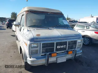 1989 GMC Vandura z VIN 1GDEG25K1K7521984, wystawiony jako IAAI lot #41371811 z przebiegiem 43 502 mil mil oraz . Historia ofert i sprzedaży dostępna na DreamBid. Obrazek 1.