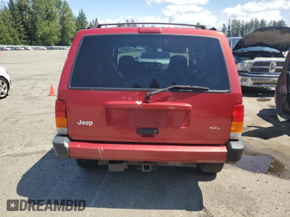 1999 Jeep Cherokee Sport z VIN 1J4FF68SXXL525944, wystawiony jako Copart lot #57653905 z przebiegiem 102 057 mil mil oraz Szkoda całkowita • Salvage title. Historia ofert i sprzedaży dostępna na DreamBid. Obrazek 6.