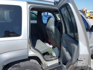 2005 Jeep Liberty Renegade with VIN 1J4GK38K65W579798, listed as a IAAI auction lot 42023592 with 159,147 mi miles. Bid and sale history available at carsss.com. Image 8.