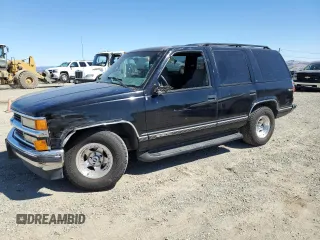 1995 Chevrolet Tahoe z VIN 1GNEC13K0SJ458724, wystawiony jako Copart lot #70678714 z przebiegiem 254 607 mil mil oraz Szkoda całkowita • Salvage title. Historia ofert i sprzedaży dostępna na DreamBid. Obrazek 1.