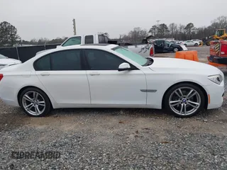 2014 BMW 7 Series 740i with VIN WBAYA6C51ED144387, listed as a IAAI auction lot 41226638 with 161,448 mi miles. Bid and sale history available at carsss.com. Image 13.