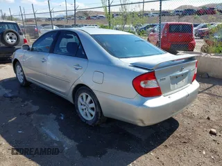 2003 Toyota Camry LE with VIN 4T1BE30K63U769219, listed as a IAAI auction lot 42178777 with 293,769 mi miles and . Bid and sale history available at DreamBid. Image 3.