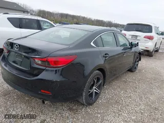 2014 Mazda Mazda6 i Sport with VIN JM1GJ1U62E1149446, listed as a IAAI auction lot 42016756 with 147,126 mi miles. Bid and sale history available at carsss.com. Image 4.