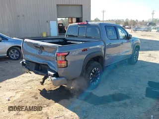 2022 Nissan Frontier SV with VIN 1N6ED1EKXNN666736, listed as a IAAI auction lot 41654456 with 47,935 mi miles and . Bid and sale history available at DreamBid. Image 4.