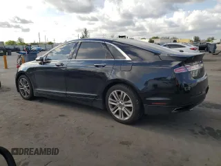 2016 Lincoln MKZ z VIN 3LN6L2G97GR614647, wystawiony jako Copart lot #55955655 z przebiegiem 142 655 mil mil oraz Szkoda całkowita • Salvage title. Historia ofert i sprzedaży dostępna na DreamBid. Obrazek 2.
