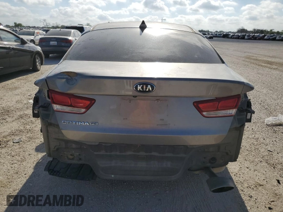 2016 Kia Optima LX with VIN 5XXGT4L39GG020999, listed as a Copart auction lot 67767444 with 99,284 mi miles and Salvage Title. Bid and sale history available at carsss.com. Image 6.