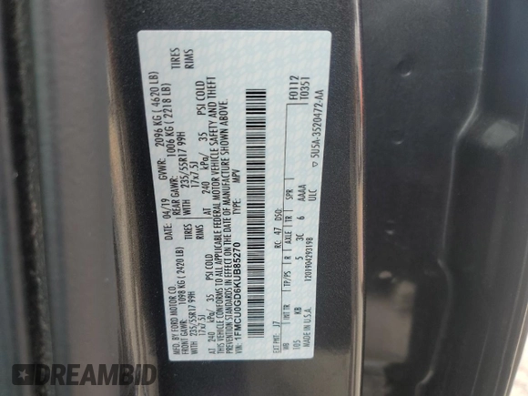 2019 Ford Escape SE z VIN 1FMCU0GD6KUB85270, wystawiony jako Copart lot #52893685 z przebiegiem 7 296 mil mil oraz Szkoda całkowita • Salvage title. Historia ofert i sprzedaży dostępna na DreamBid. Obrazek 16.