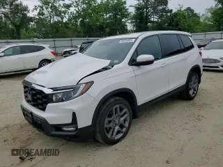 2023 Honda Passport EX-L z VIN 5FNYF8H51PB033343, wystawiony jako Copart lot #56594665 z przebiegiem 18 554 mil mil oraz Szkoda całkowita • Salvage title. Historia ofert i sprzedaży dostępna na DreamBid. Obrazek 14.