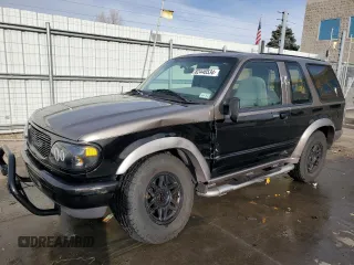 1997 Ford Explorer Sport z VIN 1FMDU24E2VUB68077, wystawiony jako Copart lot #82446534 z przebiegiem 196 458 mil mil oraz Szkoda całkowita • Salvage title. Historia ofert i sprzedaży dostępna na DreamBid. Obrazek 1.
