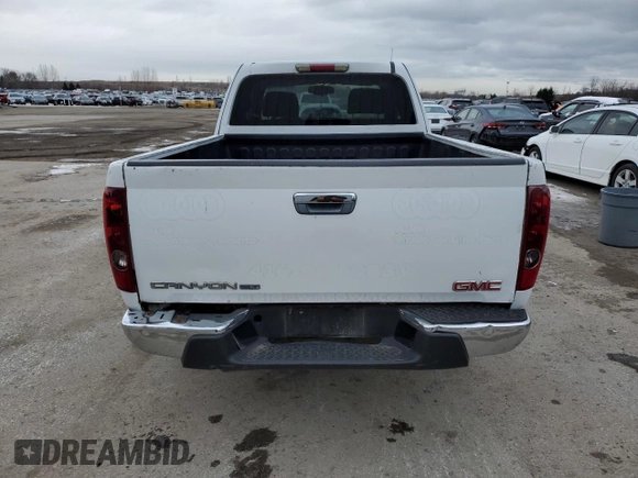 2010 GMC Canyon z VIN 1GTJTFD9XA8112041, wystawiony jako Copart lot #83326404 z przebiegiem Nie podano mil oraz Nie do naprawy • Non repairable. Historia ofert i sprzedaży dostępna na DreamBid. Obrazek 6.