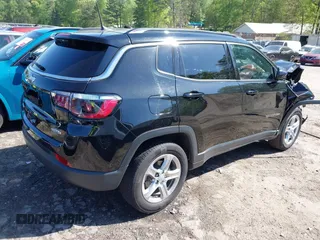 2023 Jeep Compass Latitude with VIN 3C4NJDBN0PT536141, listed as a IAAI auction lot 41974206 with 54,052 mi miles and . Bid and sale history available at DreamBid. Image 4.