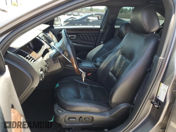 2013 Ford Taurus Limited z VIN 1FAHP2F83DG126069, wystawiony jako Copart lot #56520615 z przebiegiem 234 454 mil mil oraz Szkoda całkowita • Salvage title. Historia ofert i sprzedaży dostępna na DreamBid. Obrazek 7.