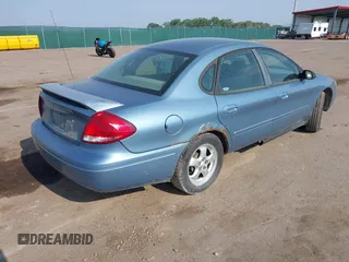 2005 Ford Taurus SE with VIN 1FAFP53275A239925, listed as a IAAI auction lot 42293953 with Not provided miles and . Bid and sale history available at DreamBid. Image 4.