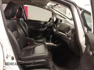2015 Honda Fit EX-L with VIN 3HGGK5H88FM776996, listed as a IAAI auction lot 42431688 with 50,566 mi miles and . Bid and sale history available at DreamBid. Image 5.