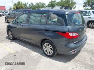 2012 Mazda 5 Sport with VIN JM1CW2BL8C0131745, listed as a IAAI auction lot 42625411 with 194,875 mi miles and . Bid and sale history available at DreamBid. Image 3.