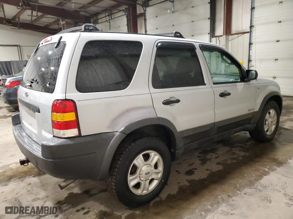 2002 Ford Escape Limited with VIN 1FMCU04122KD98349, listed as a Copart auction lot 82210654 with 129,933 mi miles and Salvage Title. Bid and sale history available at carsss.com. Image 3.