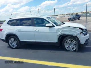 2019 Volkswagen Atlas SEL with VIN 1V2MR2CA7KC557754, listed as a IAAI auction lot 42264080 with 20,412 mi miles and . Bid and sale history available at DreamBid. Image 13.