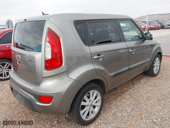 2012 Kia Soul + with VIN KNDJT2A68C7379660, listed as a IAAI auction lot 41991418 with 181,060 mi miles. Bid and sale history available at carsss.com. Image 4.