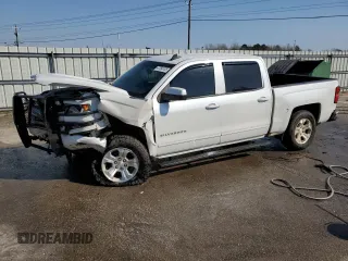 2018 Chevrolet Silverado 1500 LT with VIN 3GCUKREC0JG596842, listed as a Copart auction lot 47394105 with 135,583 mi miles and Salvage Title. Bid and sale history available at carsss.com. Image 1.