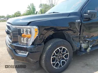 2023 Ford F-150 XL z VIN 1FTEW1EP6PKF23103, wystawiony jako IAAI lot #42390868 z przebiegiem 15 149 mil mil oraz . Historia ofert i sprzedaży dostępna na DreamBid. Obrazek 6.