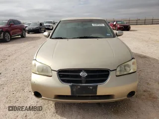 2001 Nissan Maxima SE z VIN JN1CA31D81T606081, wystawiony jako Copart lot #82989204 z przebiegiem 181 732 mil mil oraz Tytuł czysty. Historia ofert i sprzedaży dostępna na DreamBid. Obrazek 5.