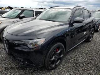 2024 Alfa Romeo Stelvio Veloce z VIN ZASPAKBNXR7D76183, wystawiony jako Copart lot #74106334 z przebiegiem Nie podano mil oraz Nie do naprawy. Historia ofert i sprzedaży dostępna na DreamBid. Obrazek 1.