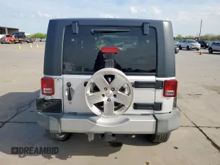 2009 Jeep Wrangler Sahara z VIN 1J4FA54169L780809, wystawiony jako Copart lot #50598925 z przebiegiem 121 078 mil mil oraz Szkoda całkowita • Salvage title. Historia ofert i sprzedaży dostępna na DreamBid. Obrazek 6.