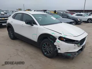 2022 Mazda CX-30 S with VIN 3MVDMBALXNM422418, listed as a IAAI auction lot 41531552 with 21,909 mi miles and . Bid and sale history available at carsss.com. Image 1.