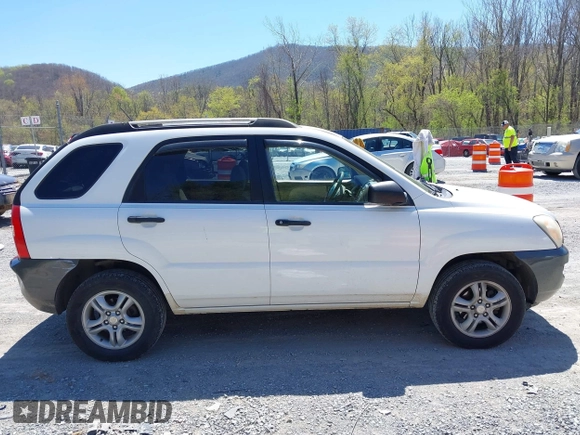 2006 Kia Sportage LX with VIN KNDJF723567151614, listed as a IAAI auction lot 42022102 with 128,564 mi miles and . Bid and sale history available at carsss.com. Image 13.