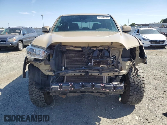 2020 Toyota Tacoma SR5 with VIN 3TMDZ5BN3LM087312, listed as a Copart auction lot 57876405 with 49,201 mi miles and Salvage title. Bid and sale history available at DreamBid. Image 5.