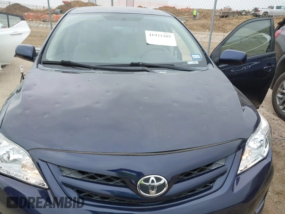 2012 Toyota Corolla L with VIN 5YFBU4EE7CP061770, listed as a IAAI auction lot 41922205 with 154,615 mi miles. Bid and sale history available at carsss.com. Image 6.