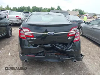 2015 Ford Taurus SEL with VIN 1FAHP2E80FG192017, listed as a IAAI auction lot 42562853 with 124,348 mi miles and . Bid and sale history available at DreamBid. Image 6.