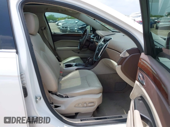 2012 Cadillac SRX Premium Collection с VIN 3GYFNCE36CS557597, выставлен на аукционе IAAI как лот 42115362 с пробегом 122 434 миль миль и . История ставок и продаж доступна на DreamBid. Изображение 5.