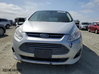 2013 Ford C-Max Energi SEL with VIN 1FADP5CU9DL521527, listed as a Copart auction lot 54533395 with 166,275 mi miles and Clean Title. Bid and sale history available at carsss.com. Image 5.