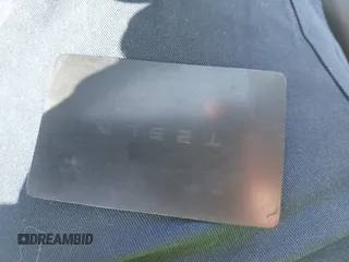 2020 Tesla Model 3 Standard Range Plus with VIN 5YJ3E1EA7LF797150, listed as a IAAI auction lot 41869088 with 75,708 mi miles and . Bid and sale history available at carsss.com. Image 11.